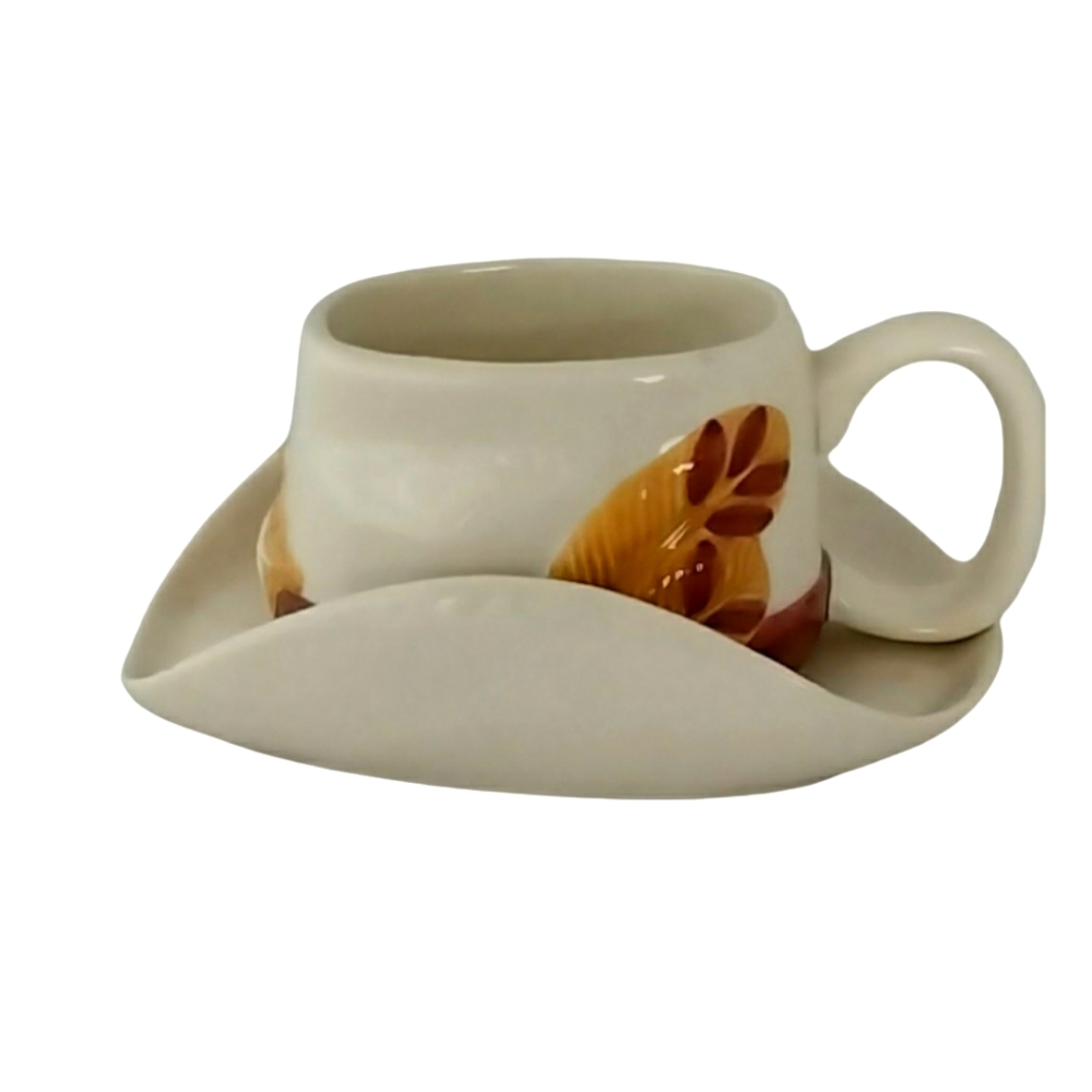 Cream Ceramic Mug with Leaf Accent and Saucer